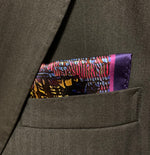Silk pocket square with image of Montreal city skyline in shakes of indigo, pink, and gold