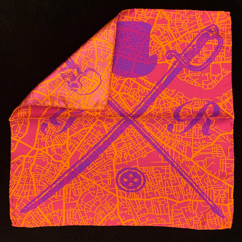 Pocket square with vector image of London city map in orange with Gentleman Rogue logo superimposed on top