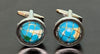 Light blue globe cufflinks with enamel continents in silver frame