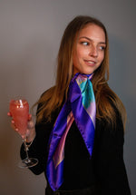 Ladies scarf with a sketched image of the Eiffel Tower in pink, purple and teal