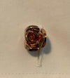 Cufflinks of an open rose in rose gold metal