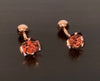 Cufflinks of an open rose in rose gold metal