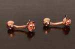 Cufflinks of an open rose in rose gold metal